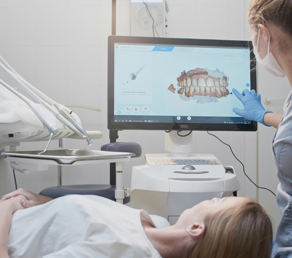 Dental patient being shown a digital image of their teeth