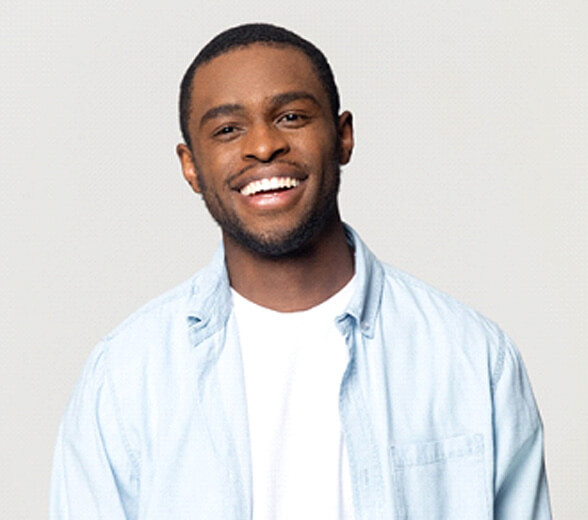 Man smiling with tooth-colored fillings in greenville