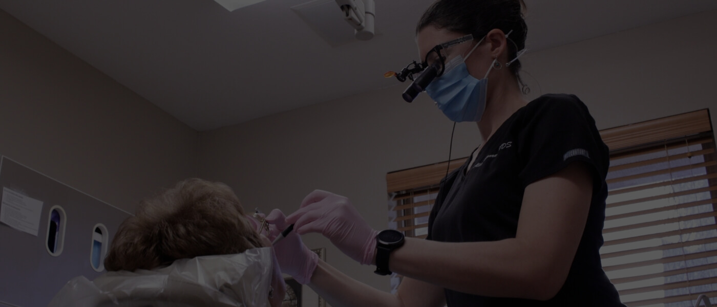 Doctor Garrad treating dental patient