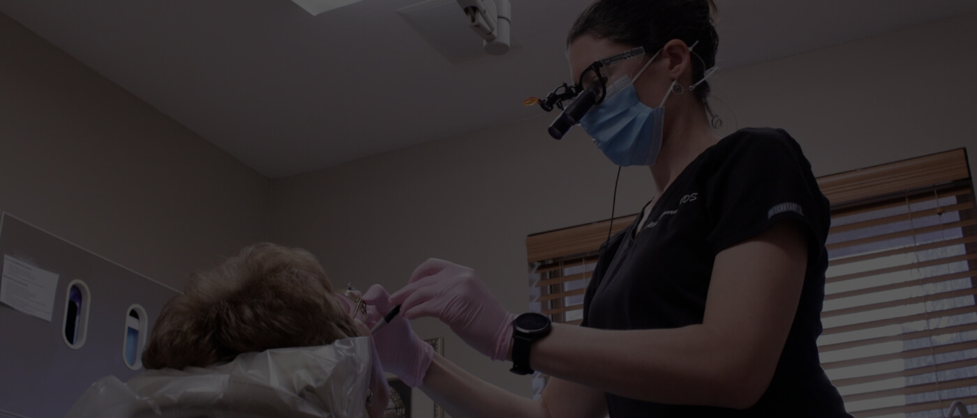 Doctor Garrad treating a dental patient