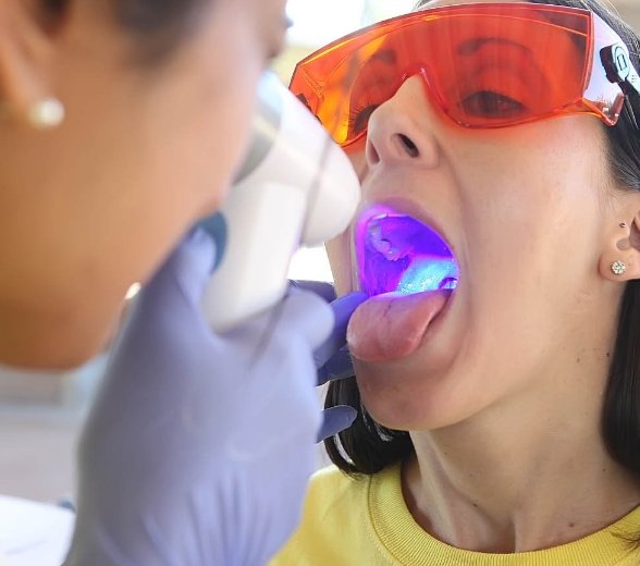 Dental patient receiving oral cancer screening