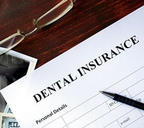 Form for dental insurance on a table