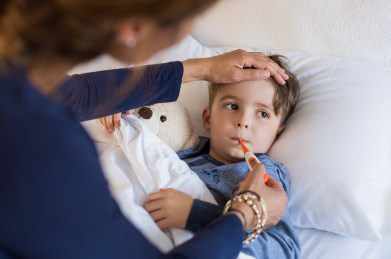 an ill child during cold and flu season in Greenville